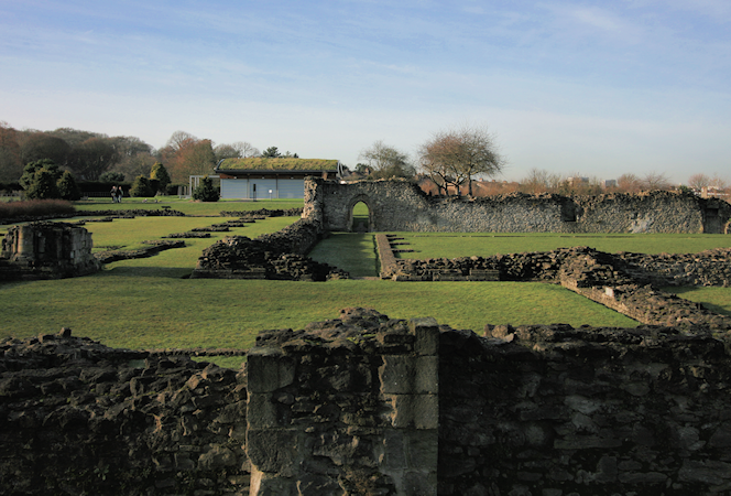Lesnes Abbey ruins with an artist's impression of the abbey on mouseover